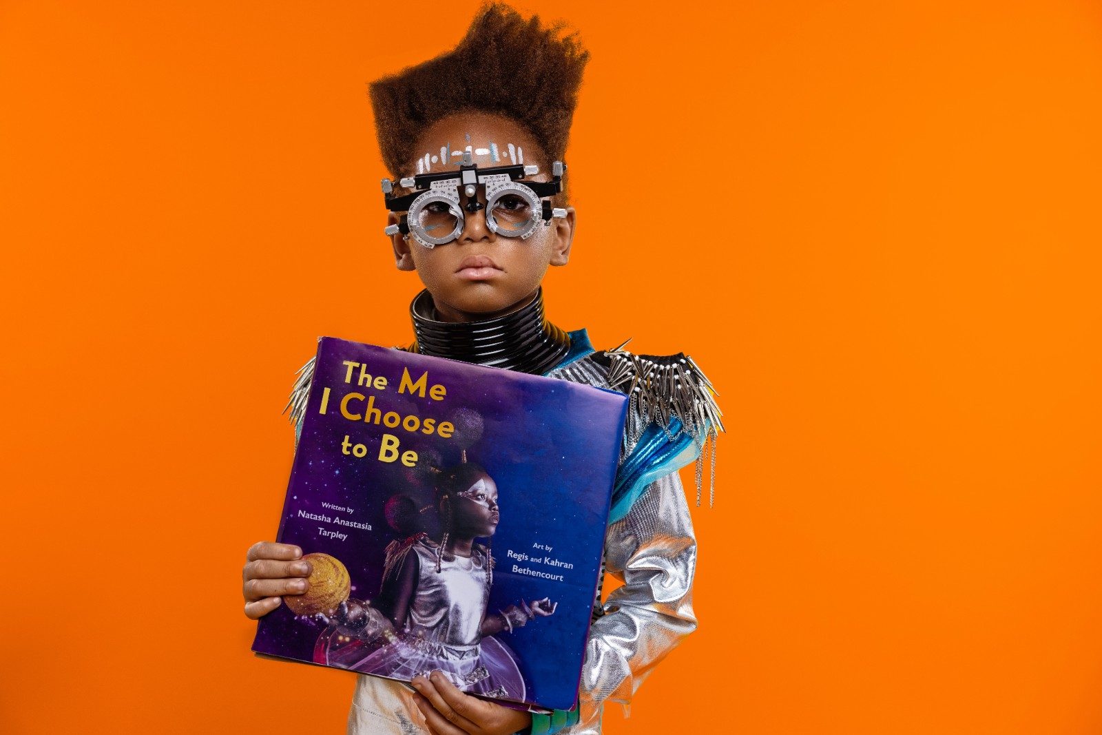 A child holding The Me I Choose To Be