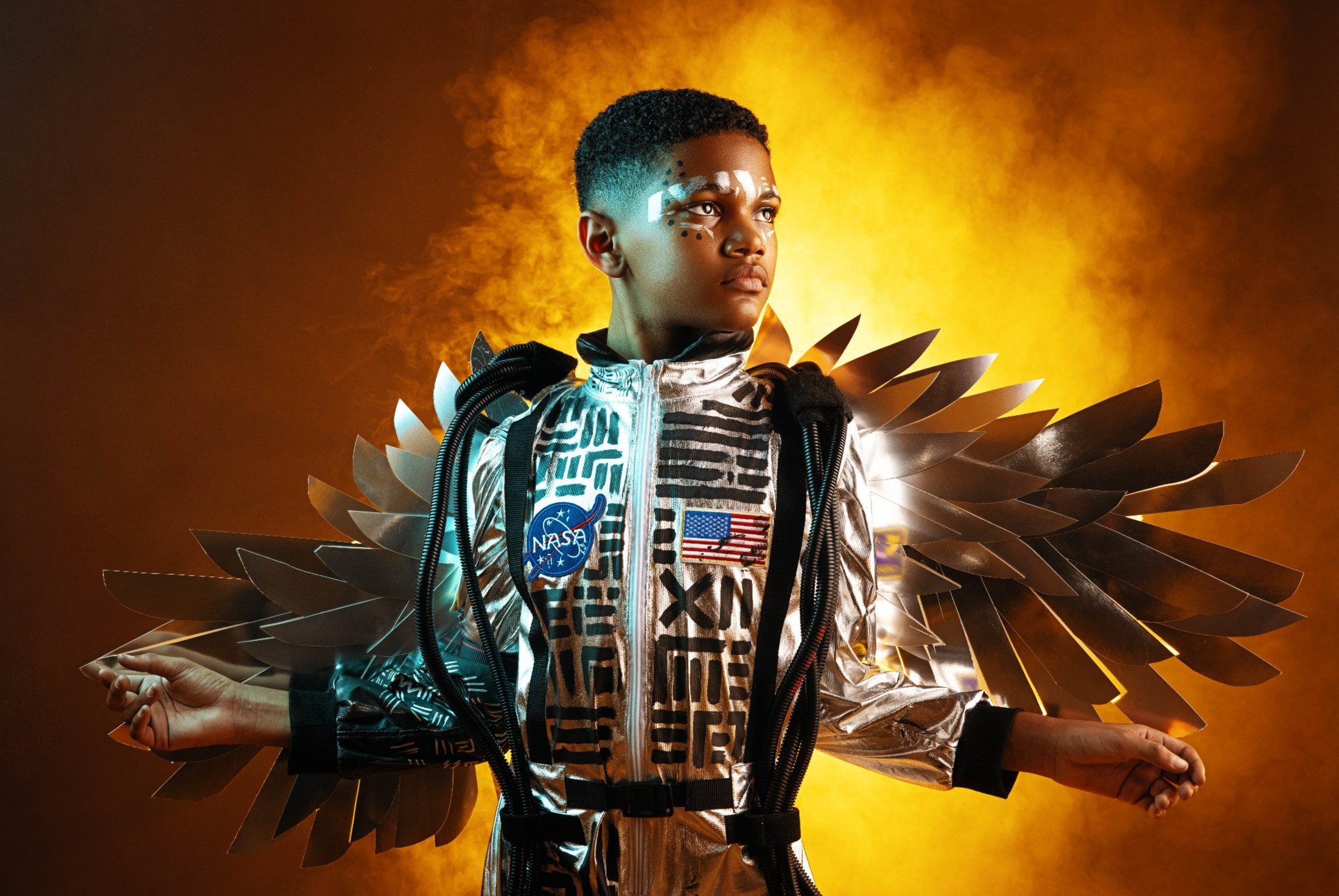 Afrofuturism series portrait, silver wings and NASA suit