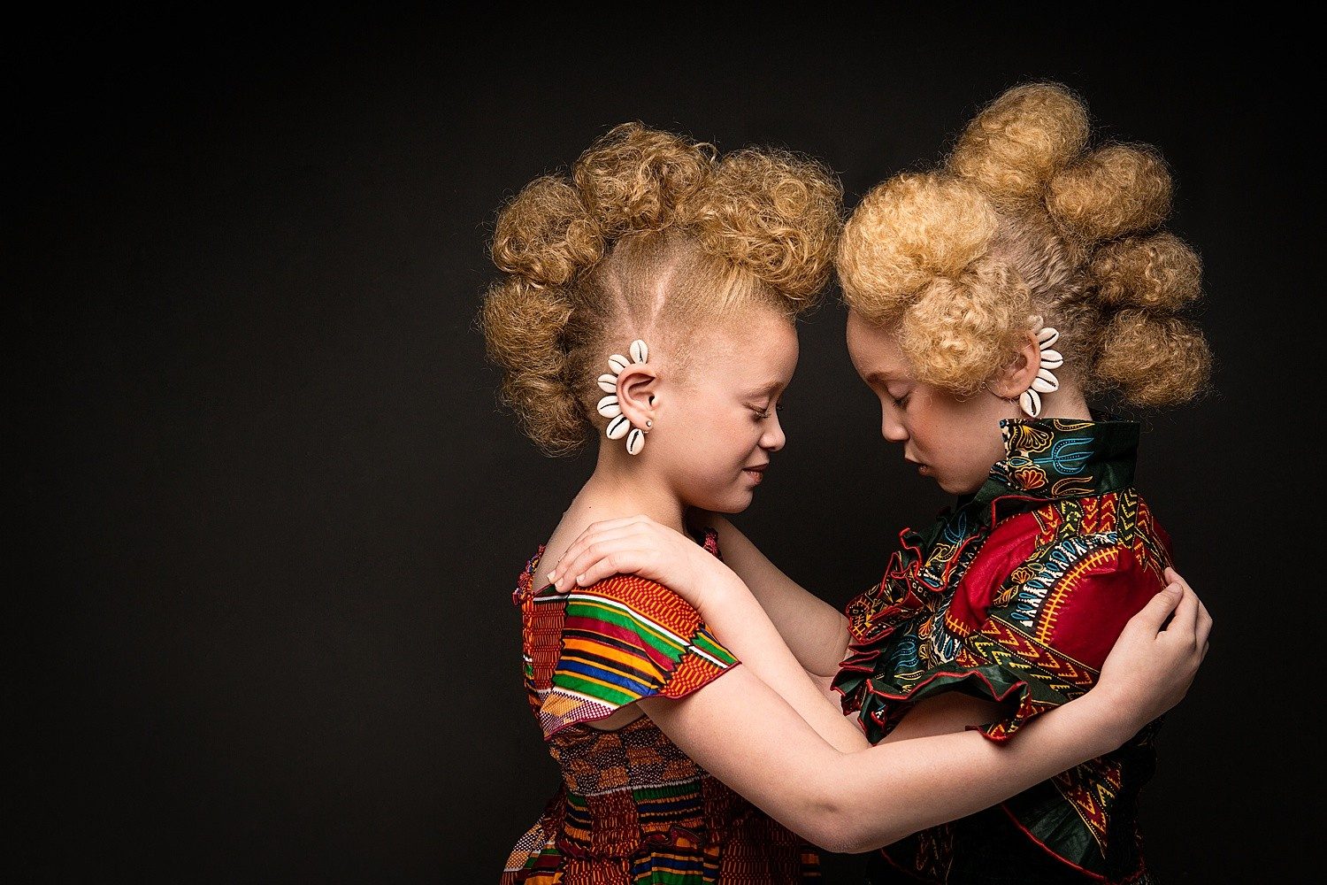 Two girls with sculpted natural hair in Ankara and kente, portrait by CreativeSoul Photography, Atlanta