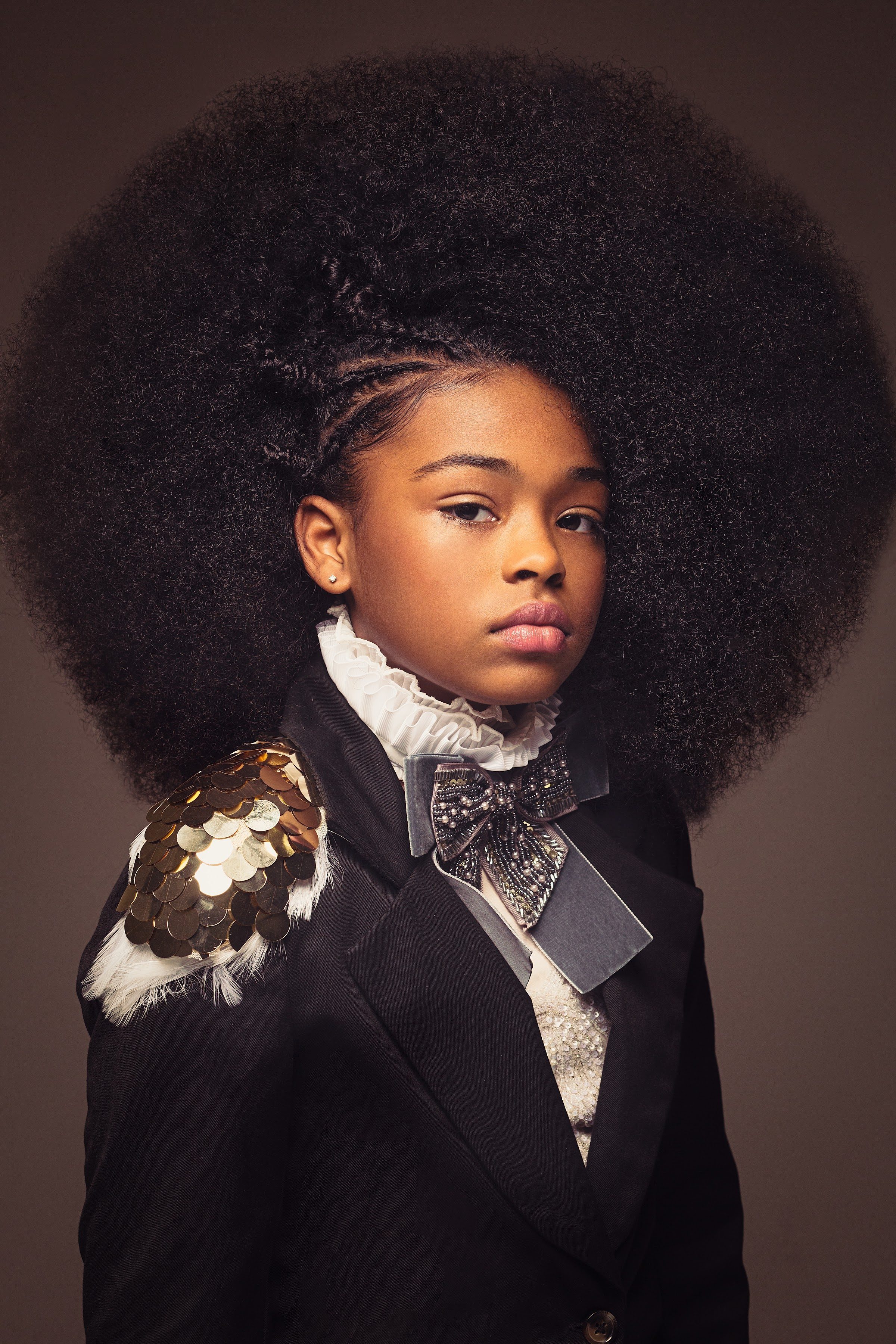 AfroArt series portrait, full afro and tuxedo styling