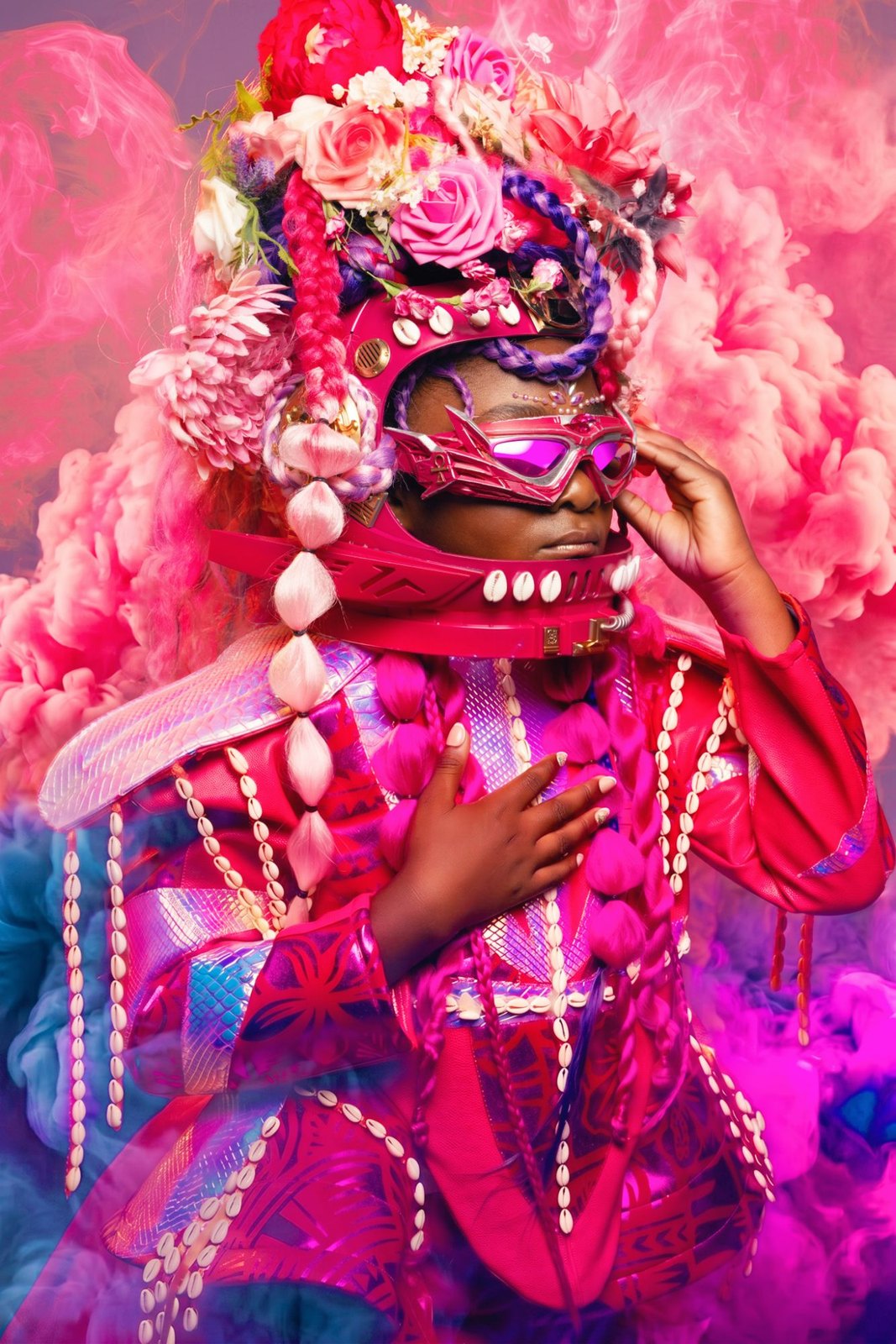 Child in a pink floral helmet, photographed by CreativeSoul